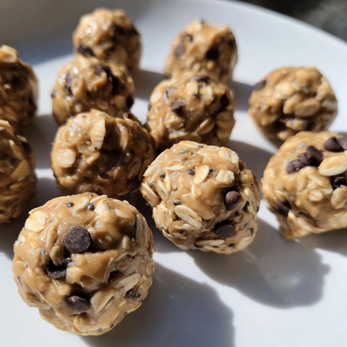 Golden Peanut Butter Protein Balls: ready for snacking, chilled and set on parchment.