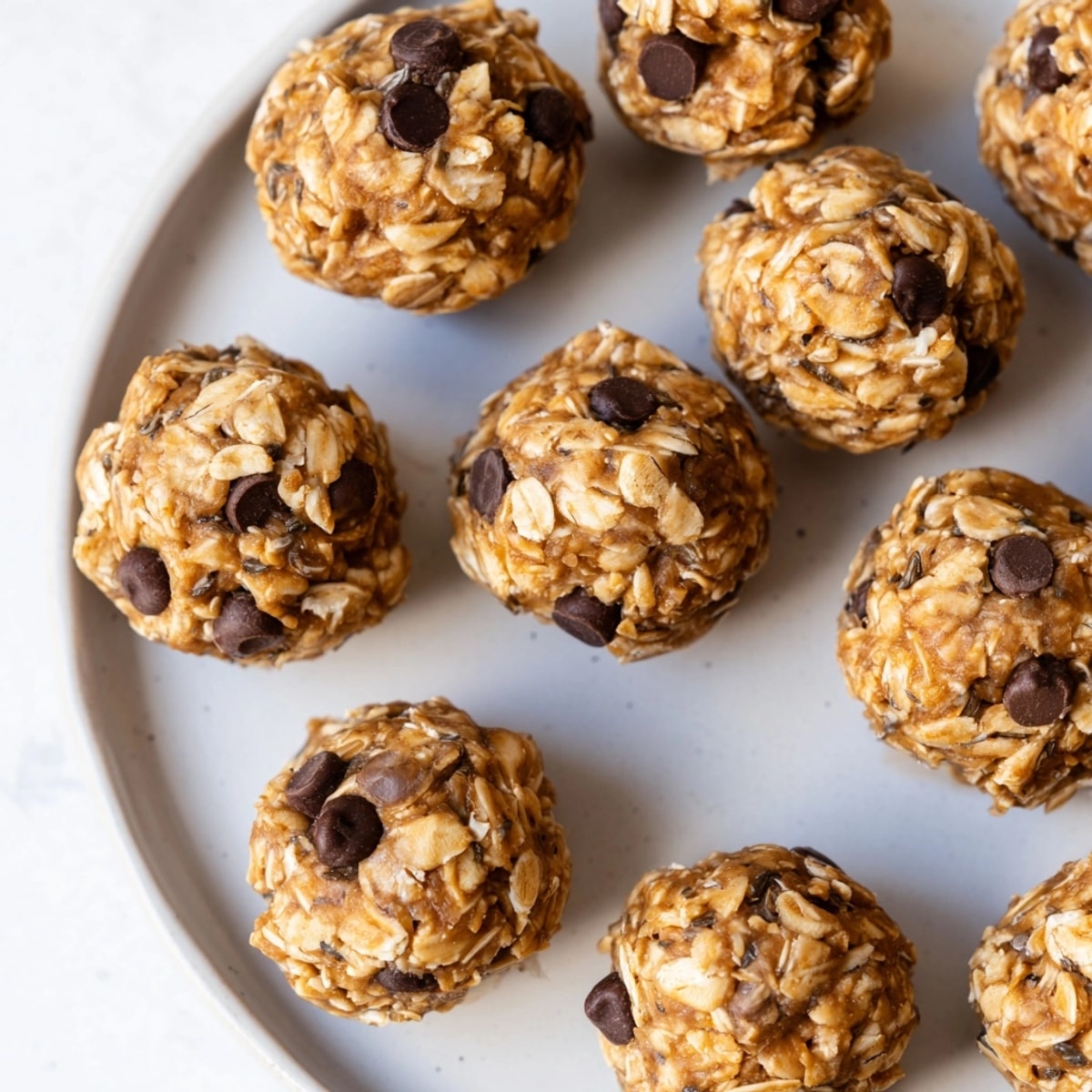 Homemade Peanut Butter Protein Balls recipe showcasing the chewy, textured oats and nuttiness.