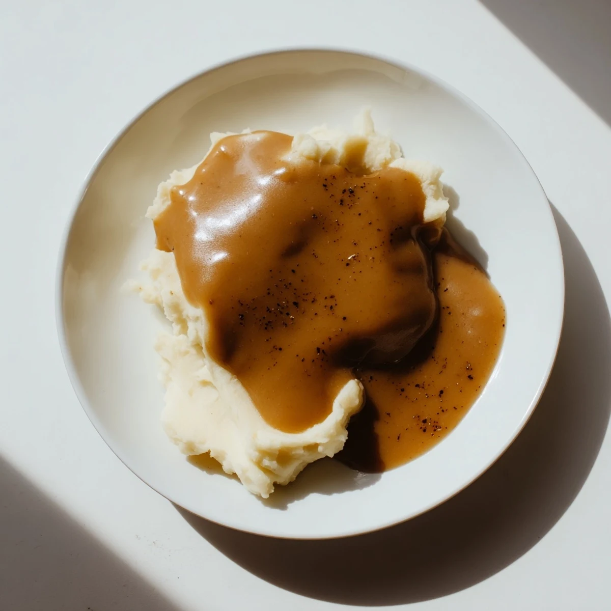 Flavorful beef gravy with a smooth texture, perfect for a classic roast beef dinner.