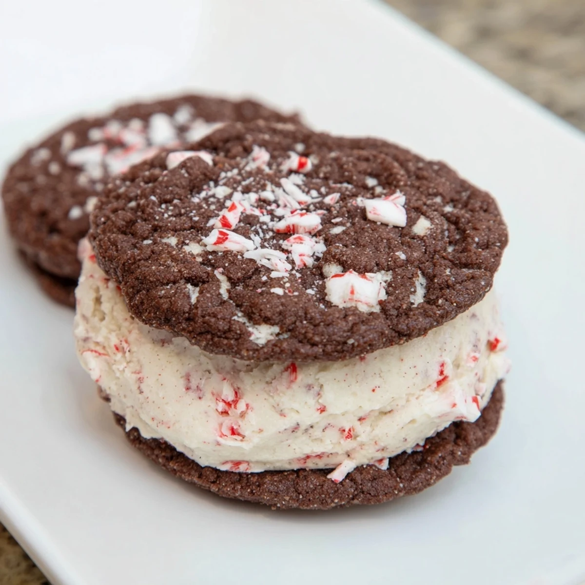 Freshly made festive Peppermint Ice Cream Sandwich, offering a delightful combination of textures.