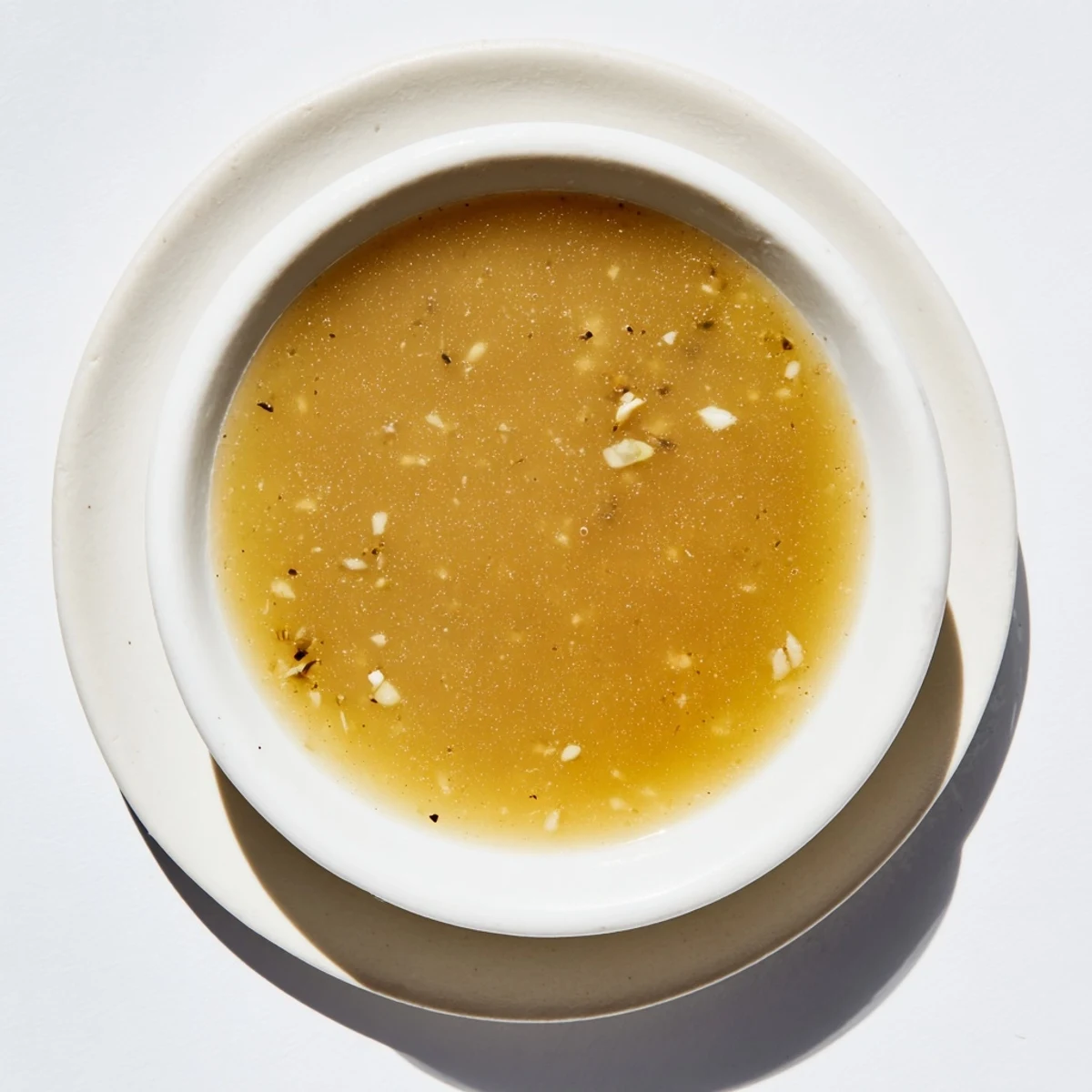 Thick, glossy Savory Sauce in a serving bowl, ready to enhance any dish's flavor.
