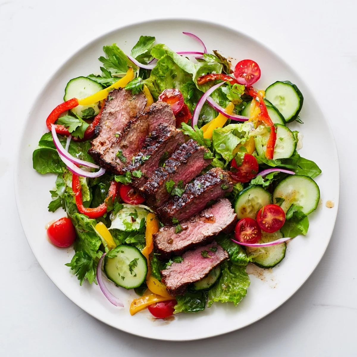 Tender beef salad with vibrant veggies and a zesty dressing—perfect for a refreshing meal.