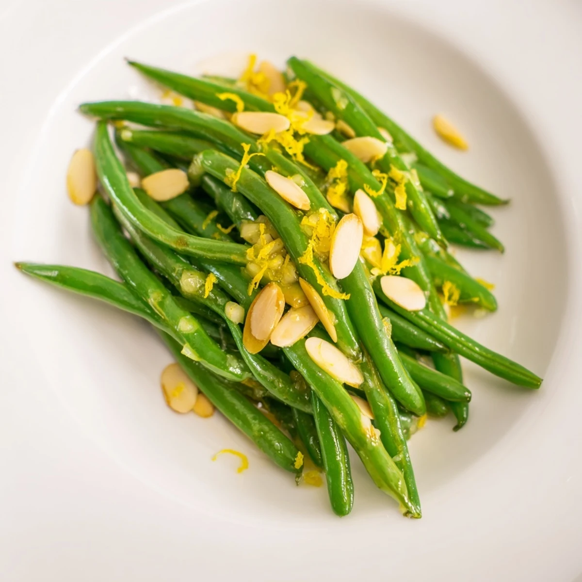 Green beans with toasted almonds and lemon, finished with butter and garlic for a bright weeknight side.