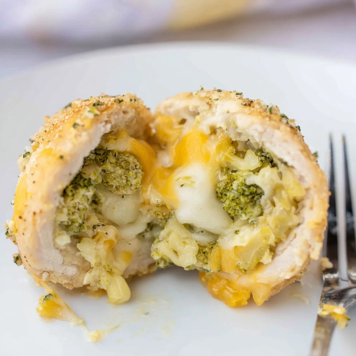 Broccoli Cheese Stuffed Chicken Breast bubbling golden, tender, served with roasted vegetables